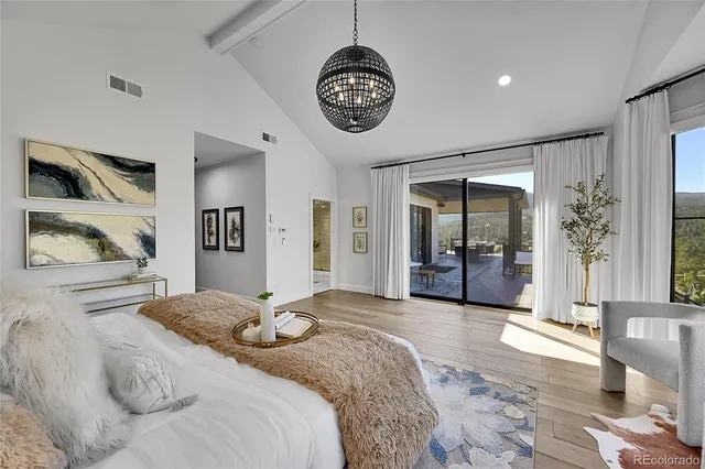 a bathroom with a sink a mirror and a shower