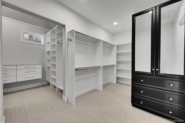 a view of a hallway with washer and dryer