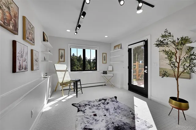 a view of a room with an empty space