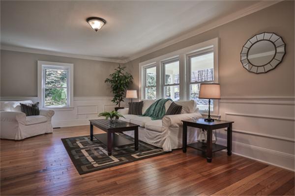 34 Ipswich Road Topsfield, MA 01983 - Photo 11 of 27 a living room with furniture a table and a large window