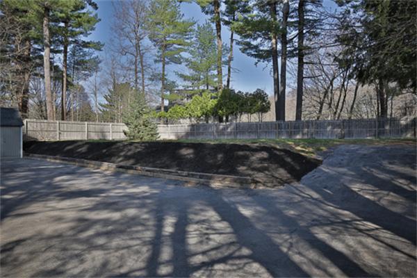 34 Ipswich Road Topsfield, MA 01983 - Photo 23 of 27 a view of a street with a tree