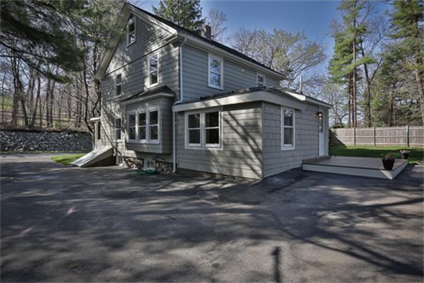 34 Ipswich Road Topsfield, MA 01983 - Photo 24 of 27 a view of a house with a yard
