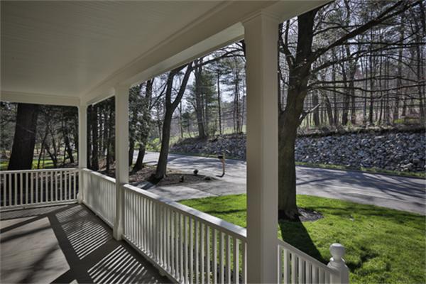 34 Ipswich Road Topsfield, MA 01983 - Photo 3 of 27 a view of a porch with a yard