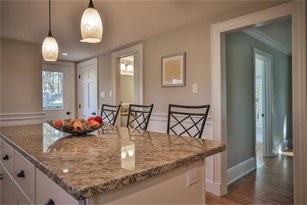 34 Ipswich Road Topsfield, MA 01983 - Photo 7 of 27 a view of a dining room and kitchen with a table chairs