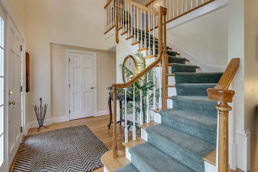 15 Cox Road Winchester, MA 01890 - Photo 4 of 27 a view of entryway and hall with wooden floor