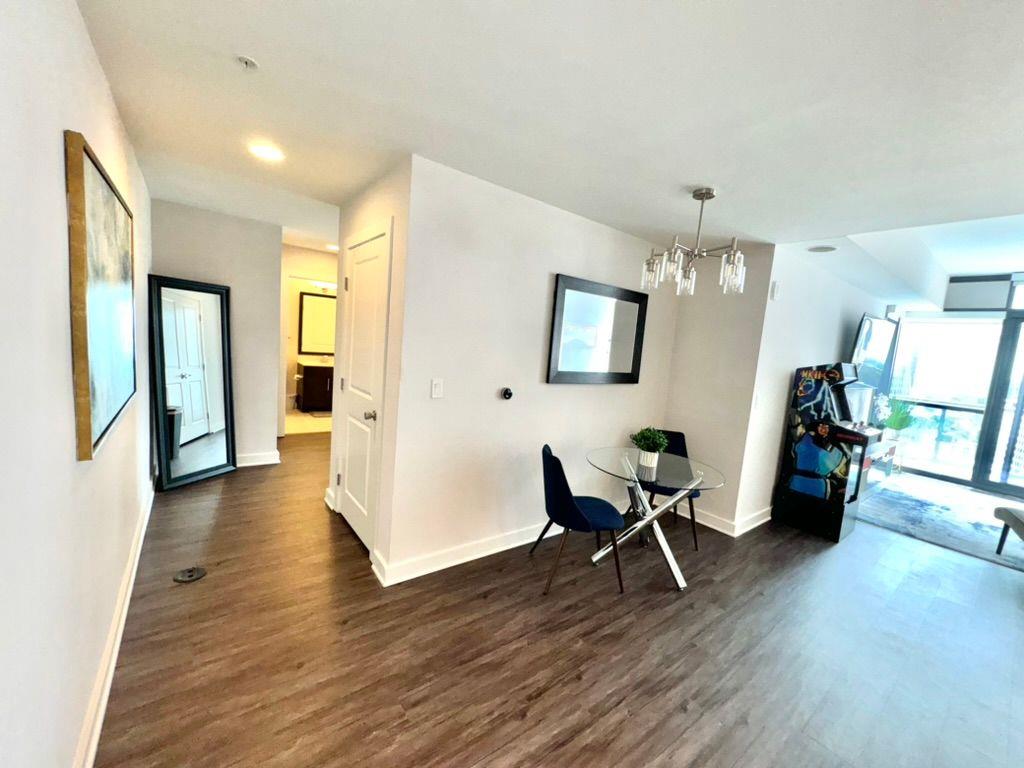 3382 Peachtree Road Northeast, Unit S08 Atlanta, GA 30326 - Photo 29 of 52 a view of a livingroom with furniture and wooden floor