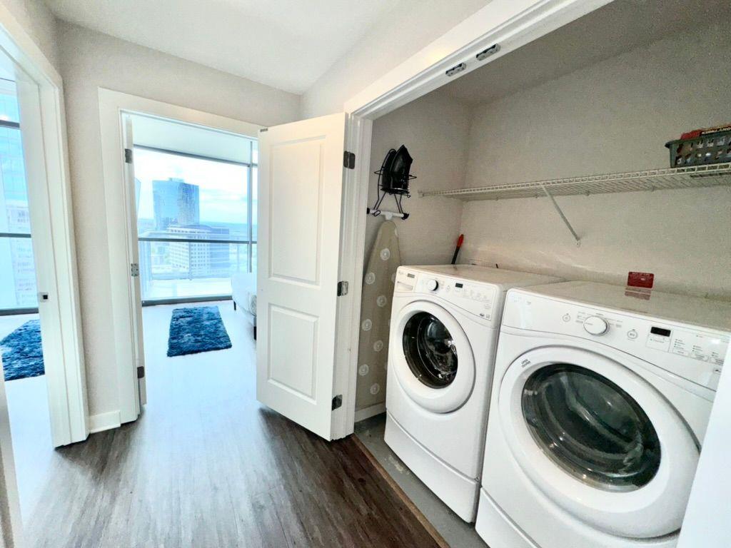3382 Peachtree Road Northeast, Unit S08 Atlanta, GA 30326 - Photo 33 of 52 a utility room with dryer and washer