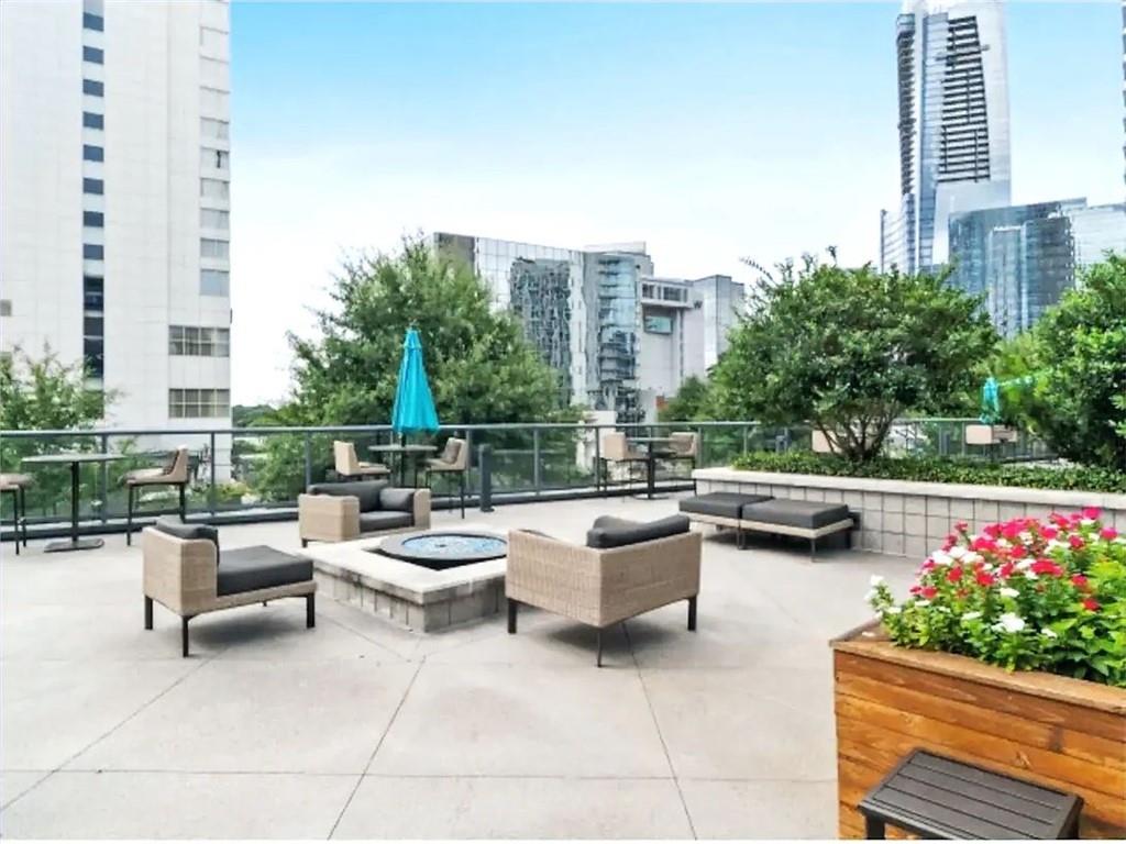 3382 Peachtree Road Northeast, Unit S08 Atlanta, GA 30326 - Photo 38 of 52 a outdoor space with lots of tables and chairs