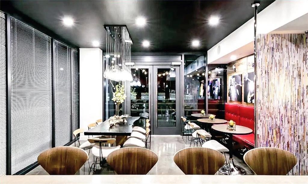 3382 Peachtree Road Northeast, Unit S08 Atlanta, GA 30326 - Photo 45 of 52 a living room with lots of furniture and chandelier