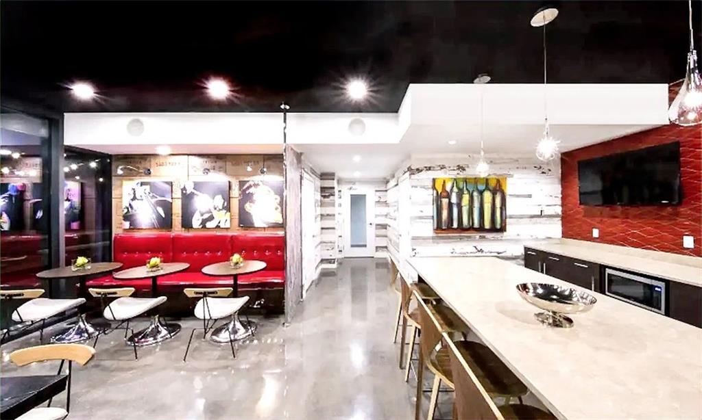 3382 Peachtree Road Northeast, Unit S08 Atlanta, GA 30326 - Photo 46 of 52 a patio with swimming pool table and chairs