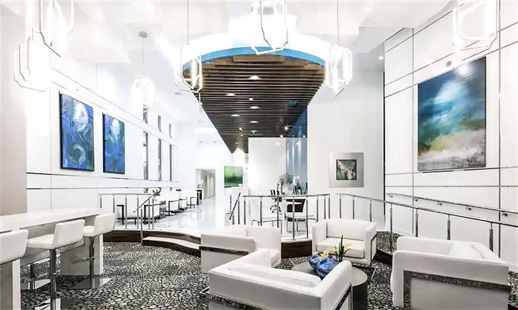 3382 Peachtree Road Northeast, Unit S08 Atlanta, GA 30326 - Photo 49 of 52 a living room with furniture and a window