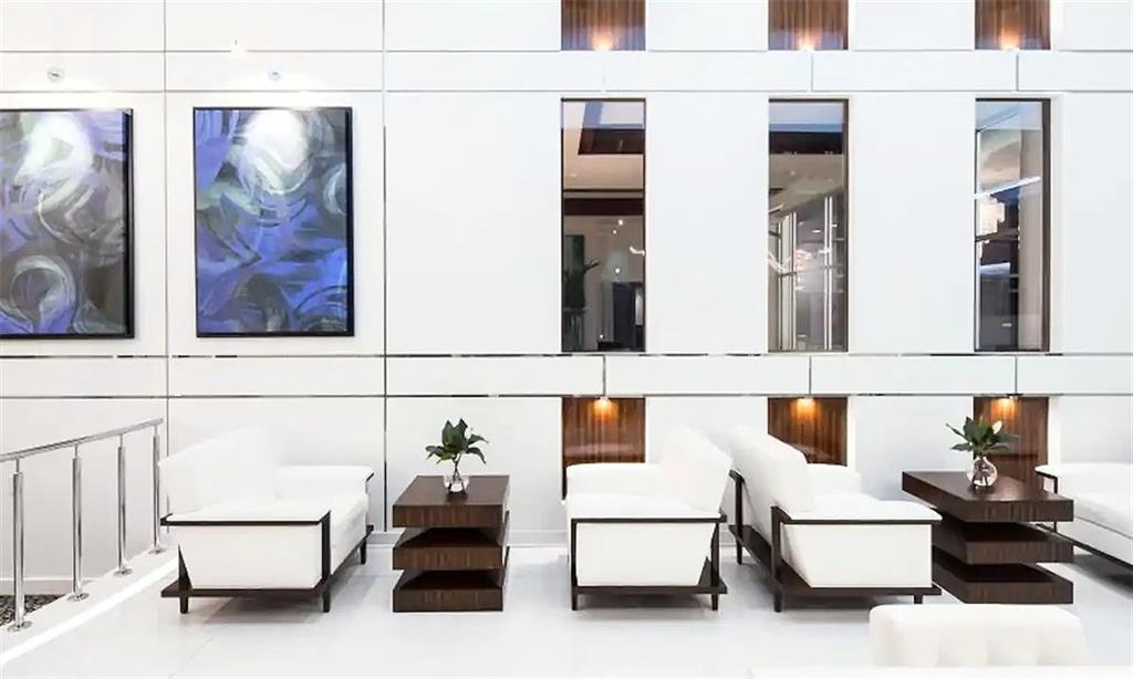 3382 Peachtree Road Northeast, Unit S08 Atlanta, GA 30326 - Photo 50 of 52 a living room with furniture and wooden floor