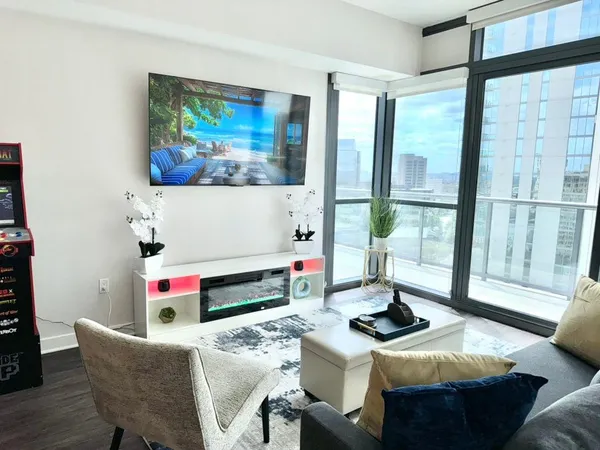 a living room with furniture and window