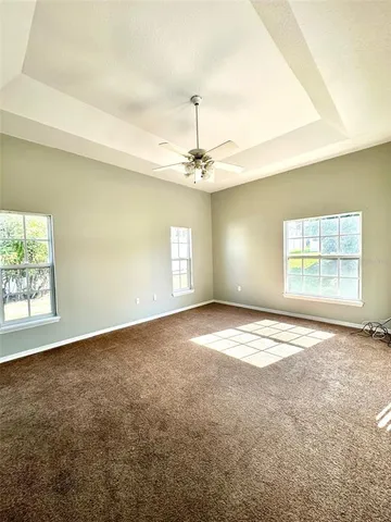 an empty room with a empty space and a window