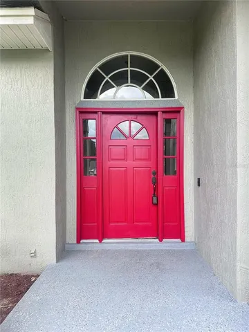 a view of a red door of the house