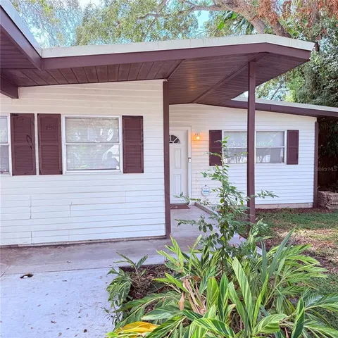 a view of a backyard with plants