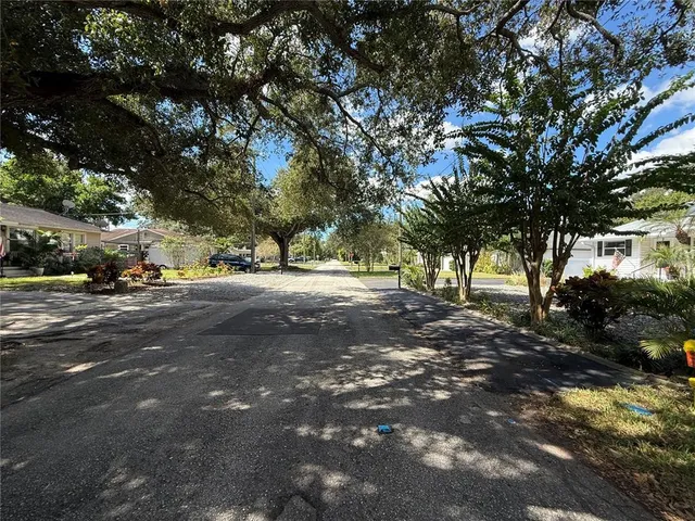 a view of road with trees