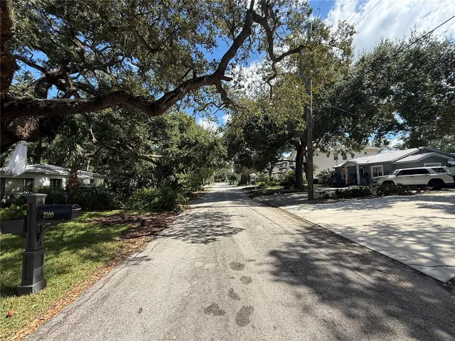 a view of road with trees