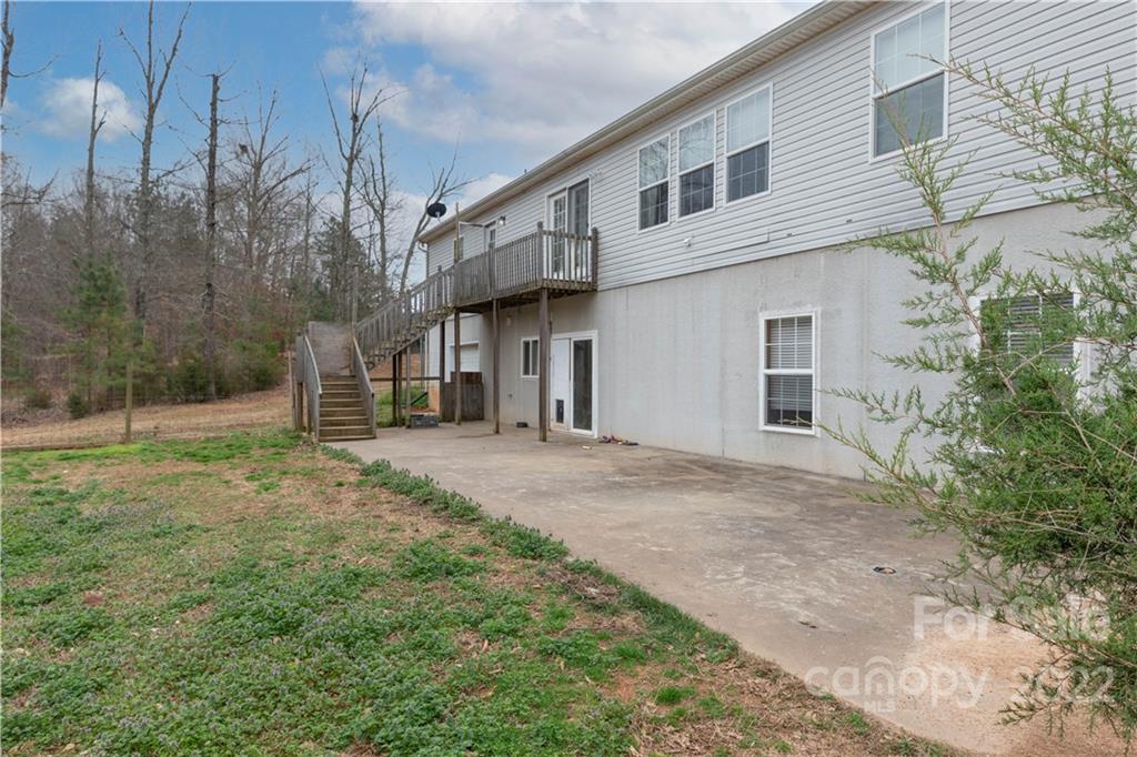 3920 Wilson Chapel Road Sharon, SC 29742 - Photo 26 of 33 a view of a house with backyard and trees