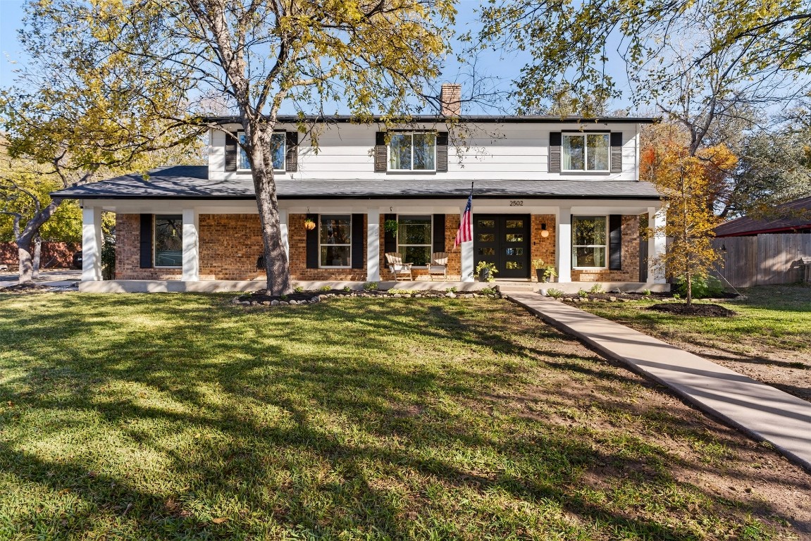 2502 Comburg Castle Way Austin, TX 78748 - Photo 8 of 35 a front view of a house with garden