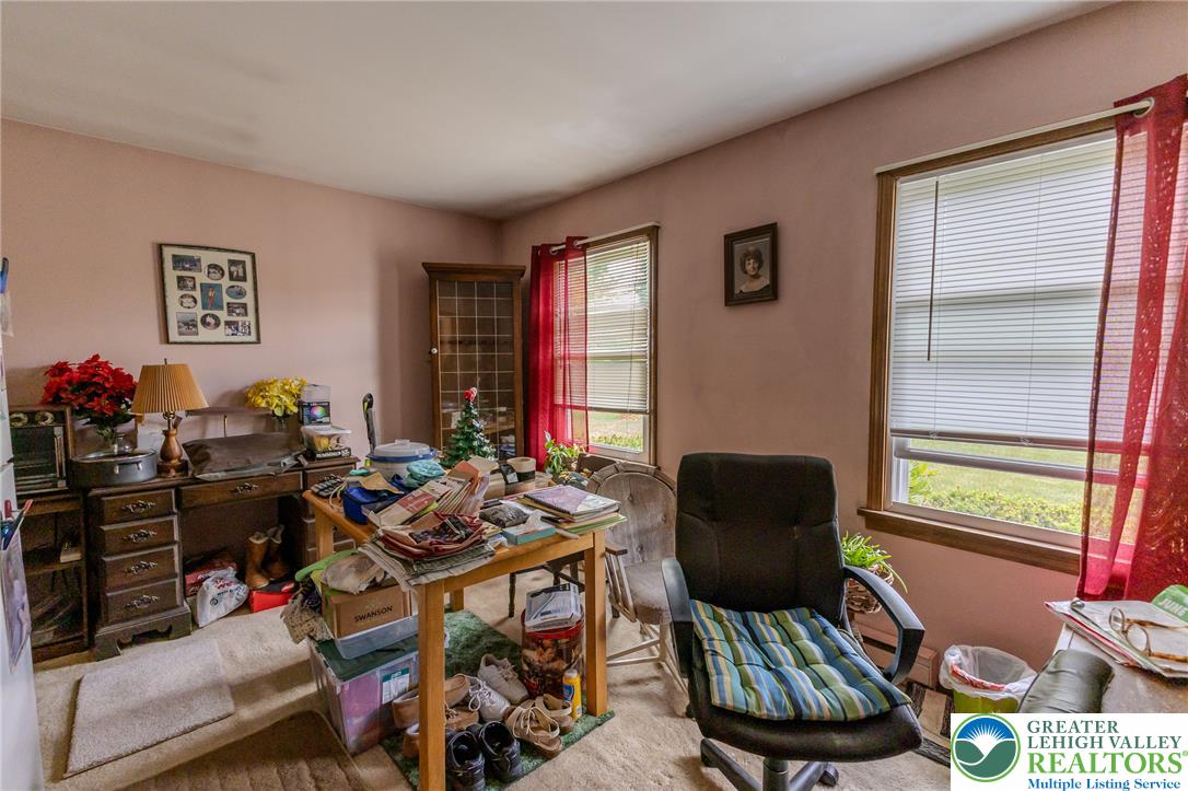 40 Locke Heights Road Bangor, PA 18013 - Photo 19 of 28 A well-lit study with windows offering views of the outdoors, ideal for a home office.