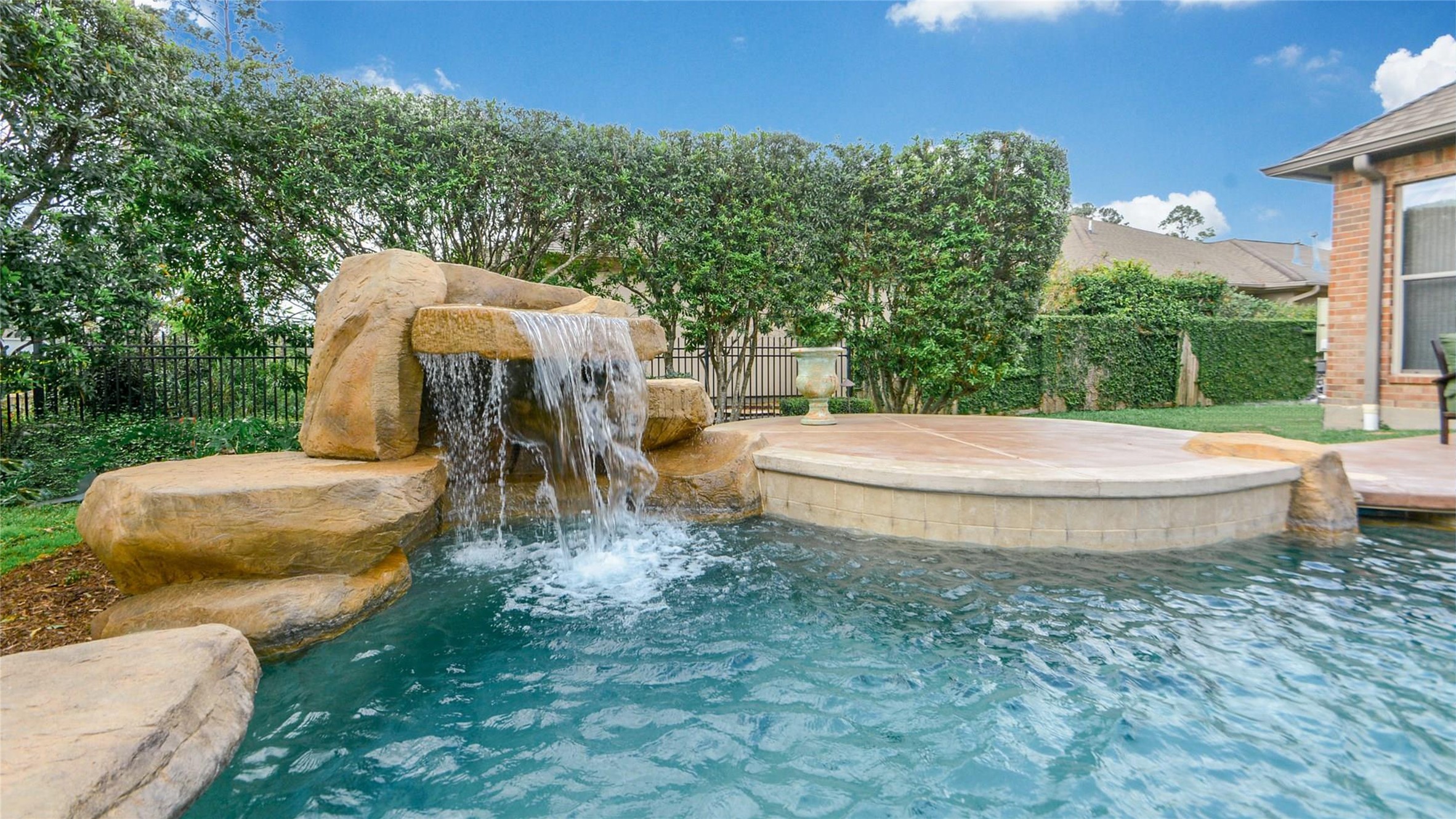 25207 Hideaway Run Drive Spring, TX 77389 - Photo 47 of 49 Waterfall has a hidden grotto under the stones