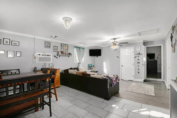 a bed room with furniture and a window