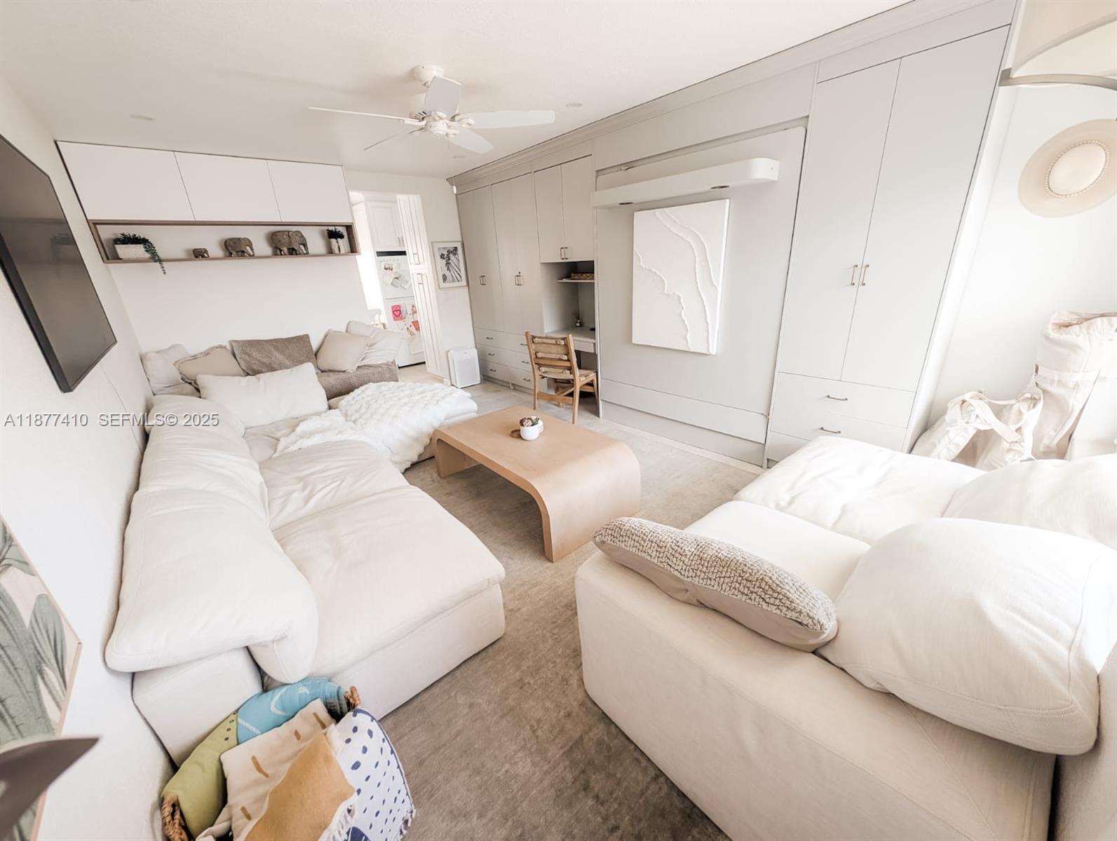 1501 South Surf Road, Unit 21 Hollywood, FL 33019 - Photo 3 of 9 a large white bed in a white room