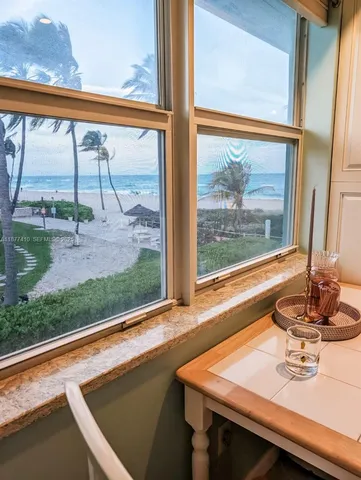 a view of a room with a large window