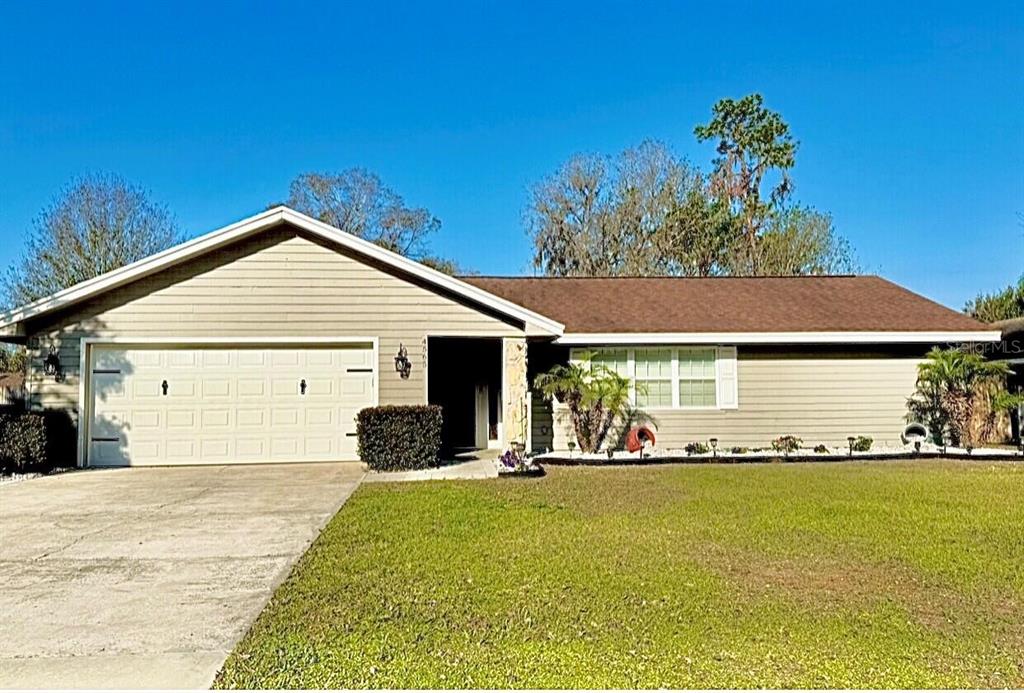 a front view of house with yard