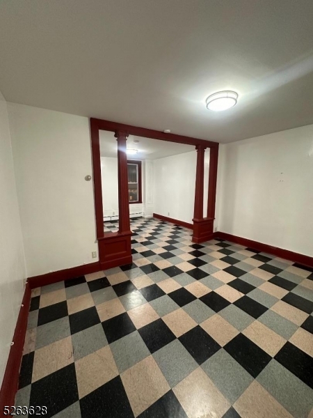 a view of a black and white checkered floor