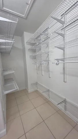 a bathroom with a toilet sink and shower