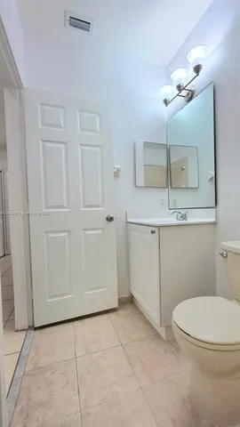 a house with a garden in the background