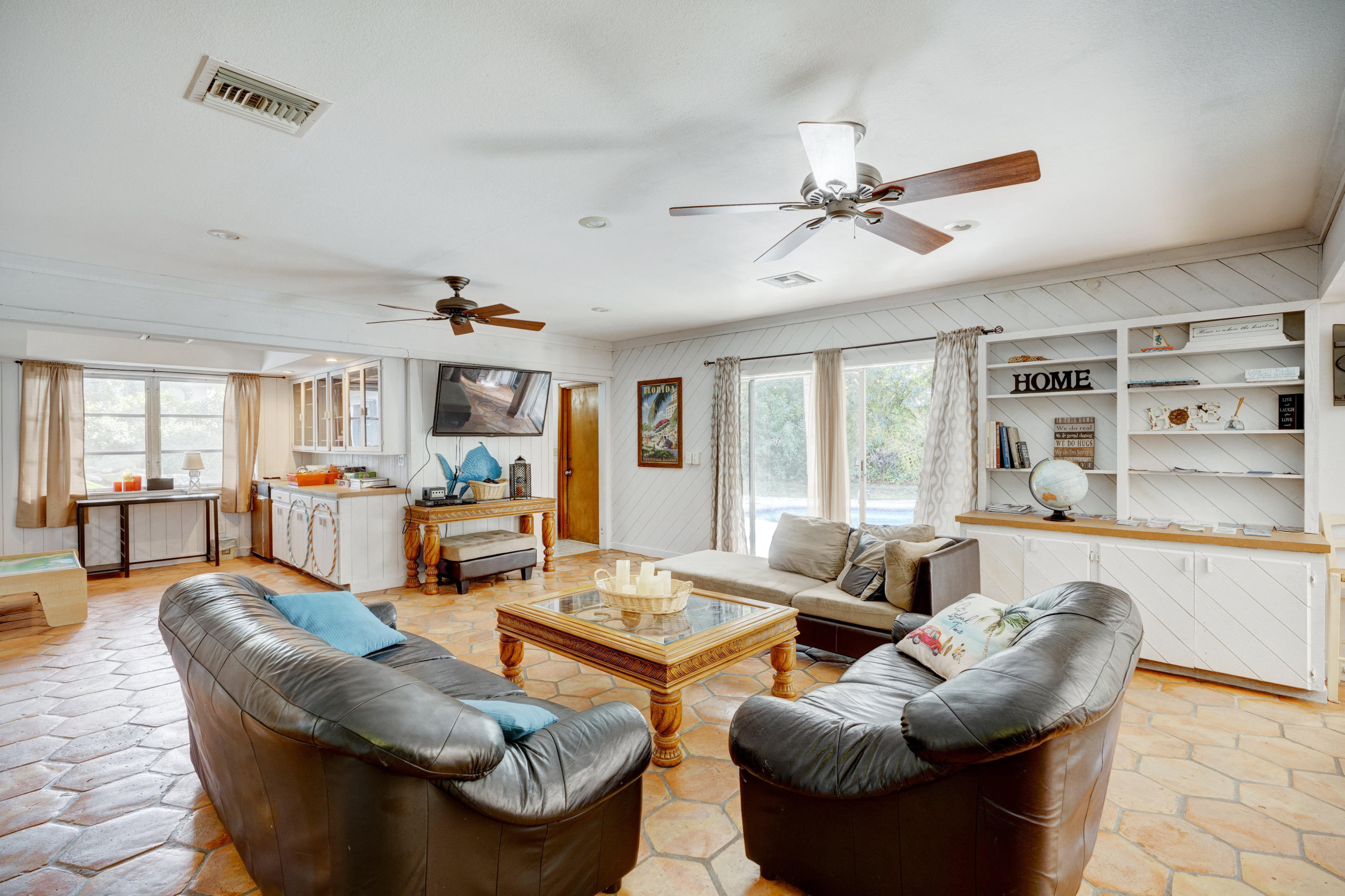 11061 Ellison Wilson Road North Palm Beach, FL 33408 - Photo 16 of 41 a living room with furniture and a large window