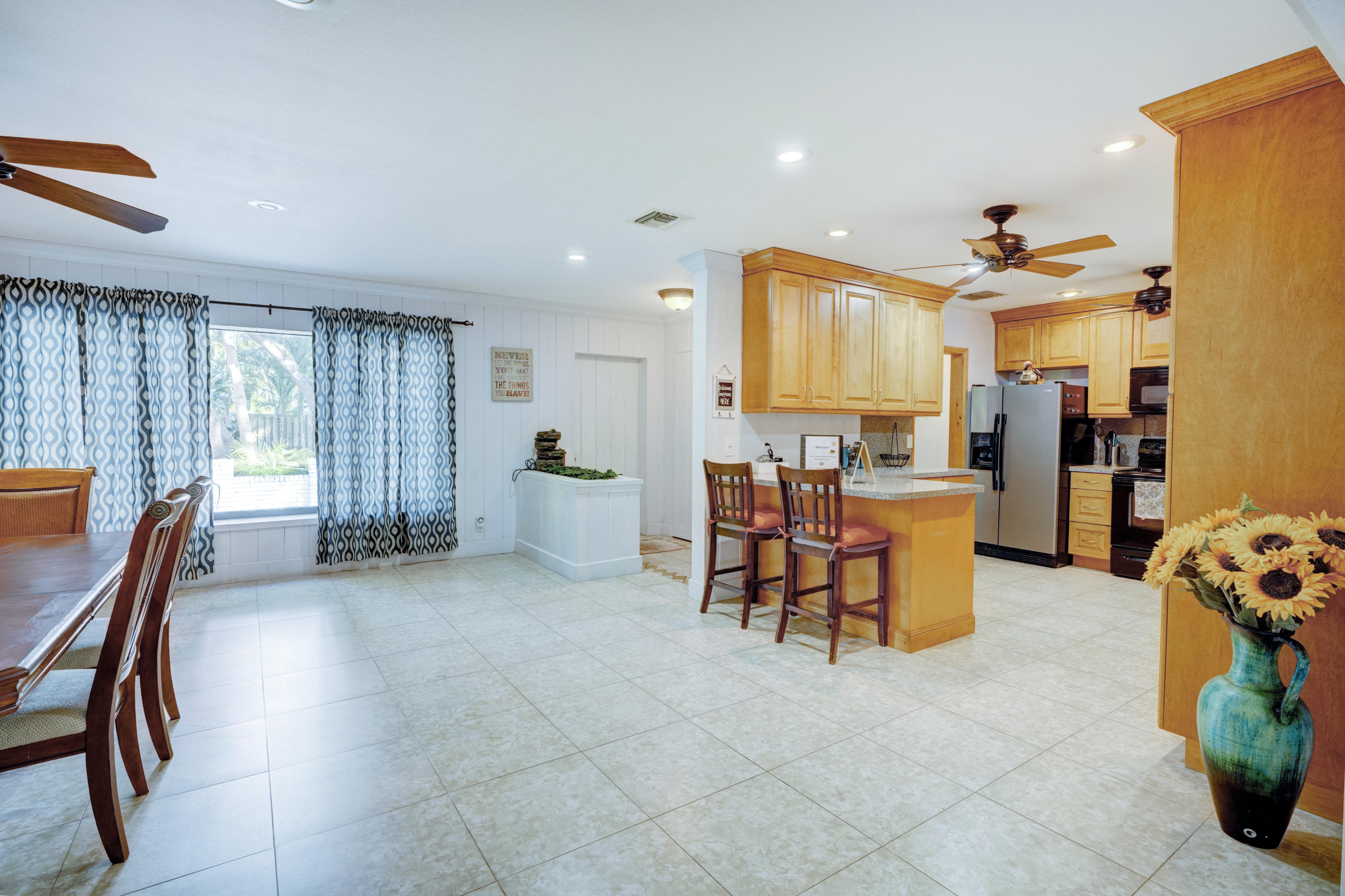 11061 Ellison Wilson Road North Palm Beach, FL 33408 - Photo 21 of 41 a view of a livingroom with furniture and windows