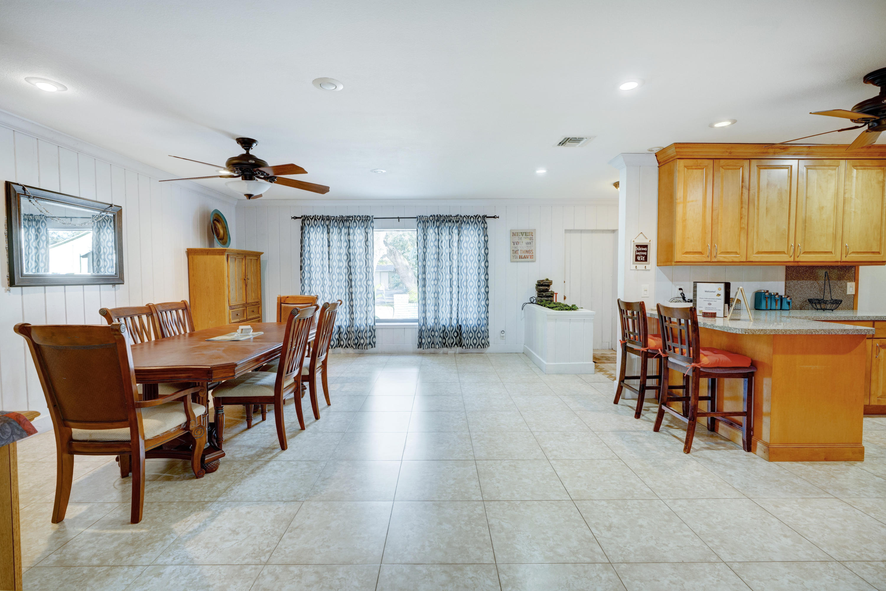 11061 Ellison Wilson Road North Palm Beach, FL 33408 - Photo 23 of 41 a view of a dining room with furniture