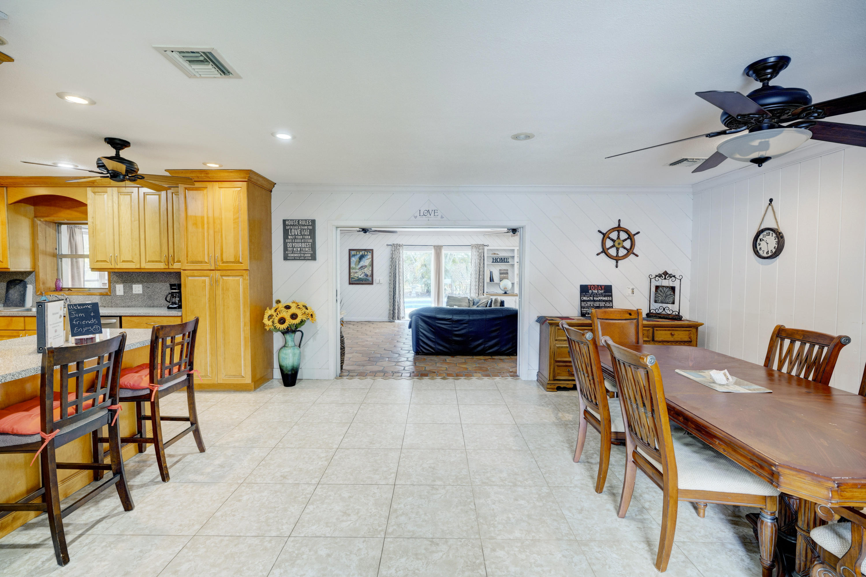 11061 Ellison Wilson Road North Palm Beach, FL 33408 - Photo 24 of 41 a living room with furniture and a table