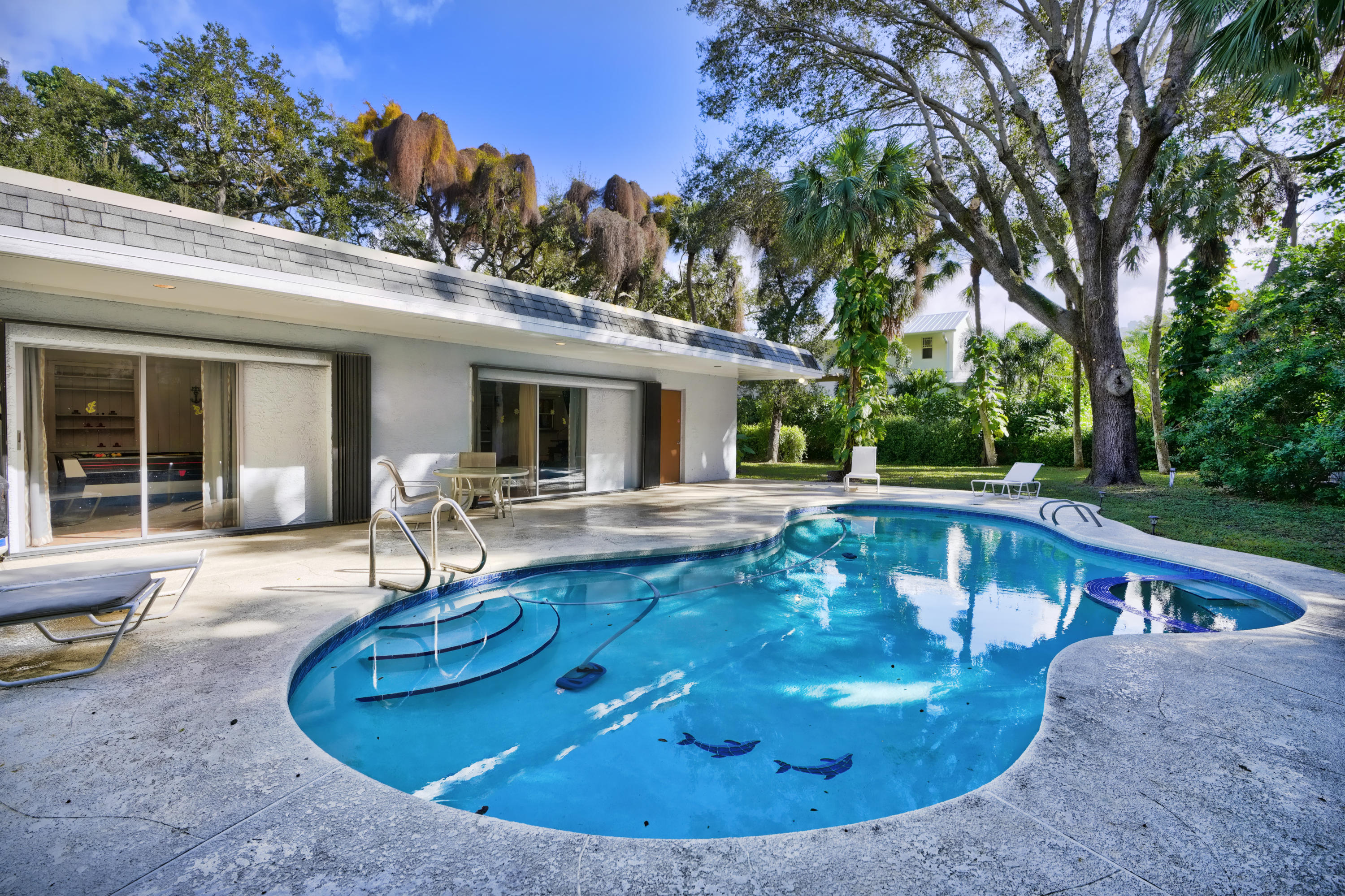 11061 Ellison Wilson Road North Palm Beach, FL 33408 - Photo 31 of 41 a view of a house with swimming pool