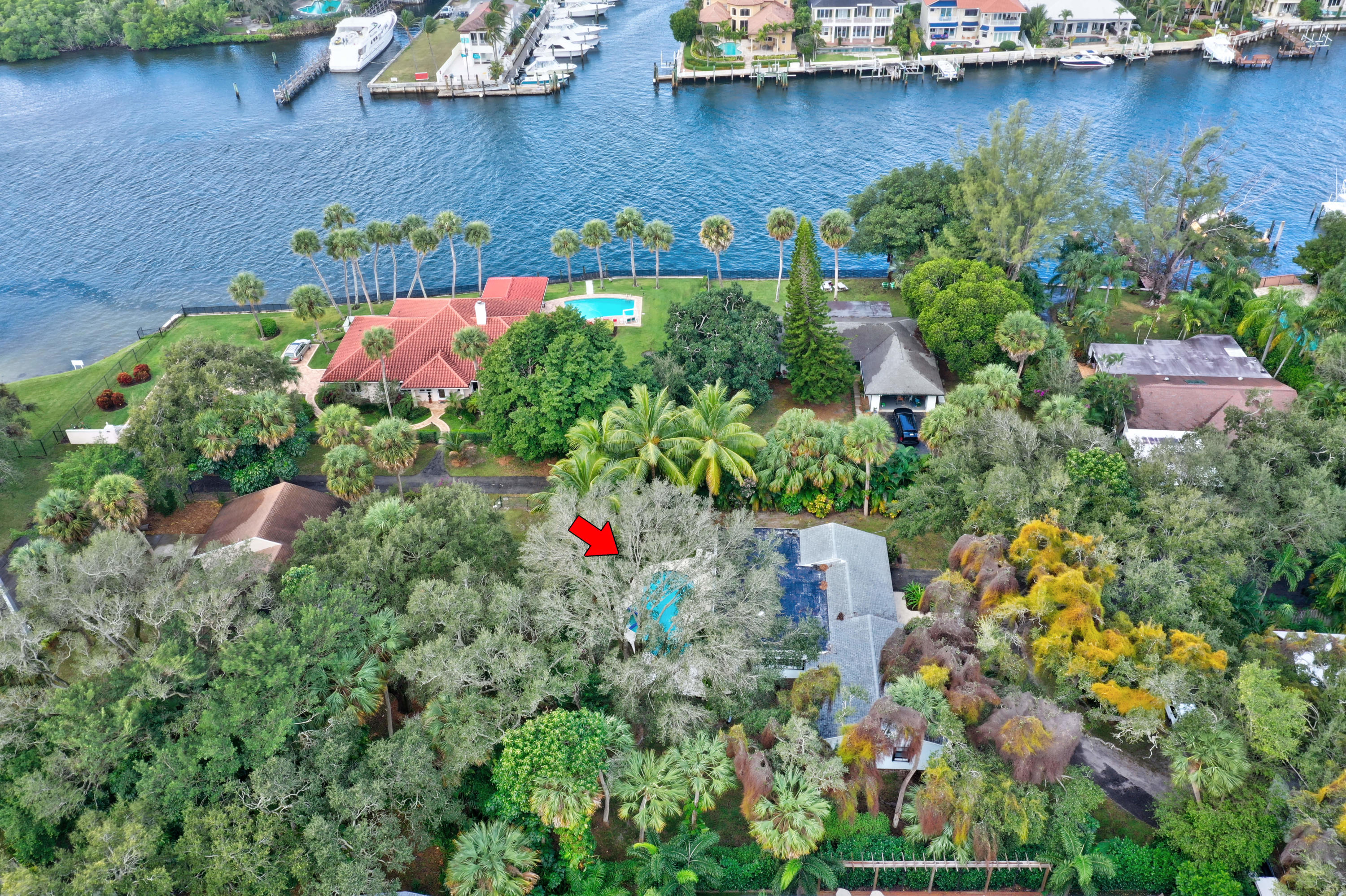 11061 Ellison Wilson Road North Palm Beach, FL 33408 - Photo 41 of 41 an aerial view of a house with a yard and lake view
