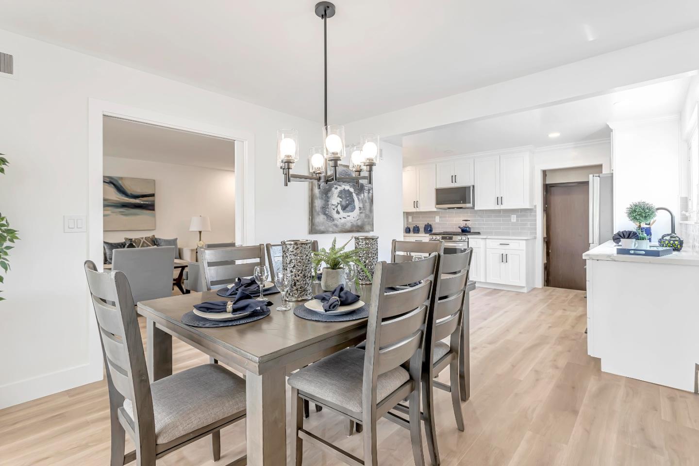 1548 Spring Street Mountain View, CA 94043 - Photo 17 of 40 a dining room with furniture a chandelier and kitchen view