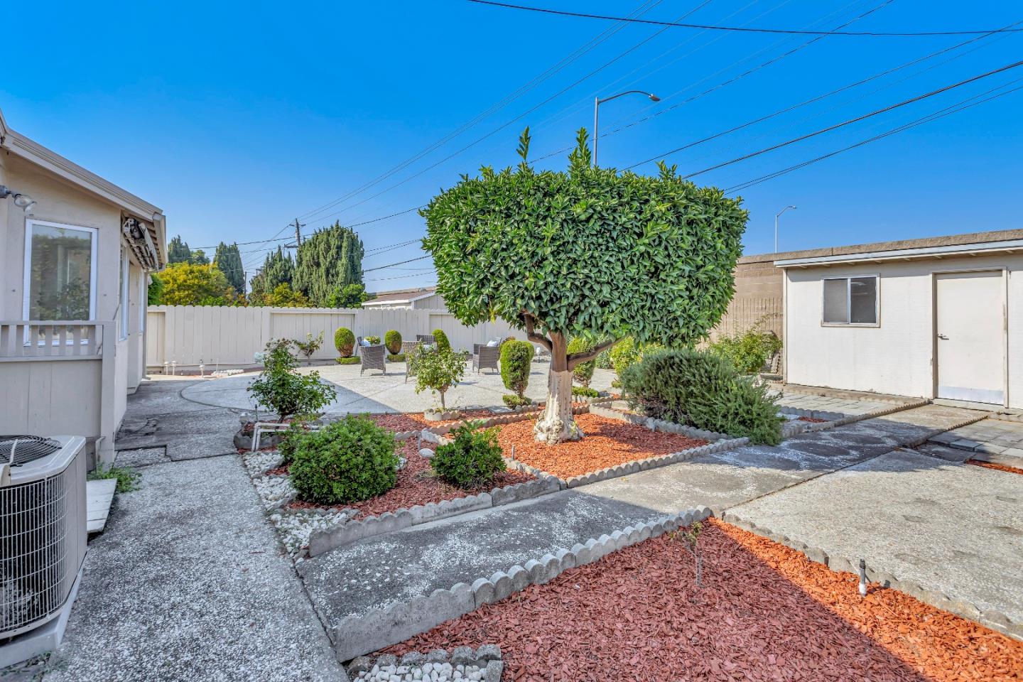 1548 Spring Street Mountain View, CA 94043 - Photo 32 of 40 a front view of a house with garden