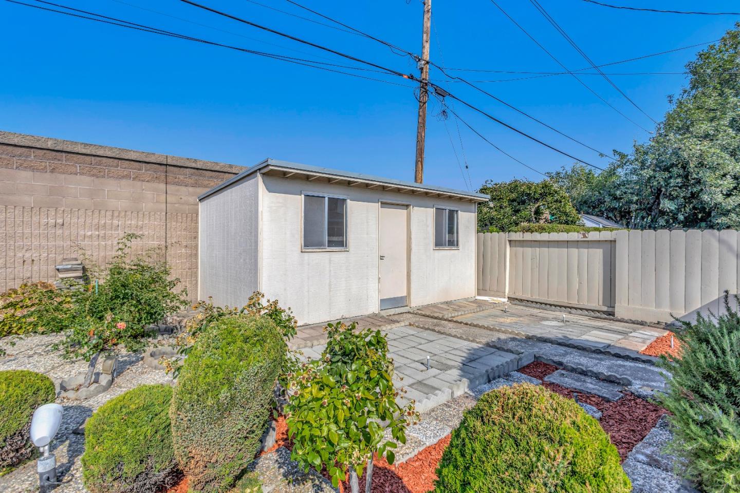 1548 Spring Street Mountain View, CA 94043 - Photo 35 of 40 a view of a backyard with potted plants