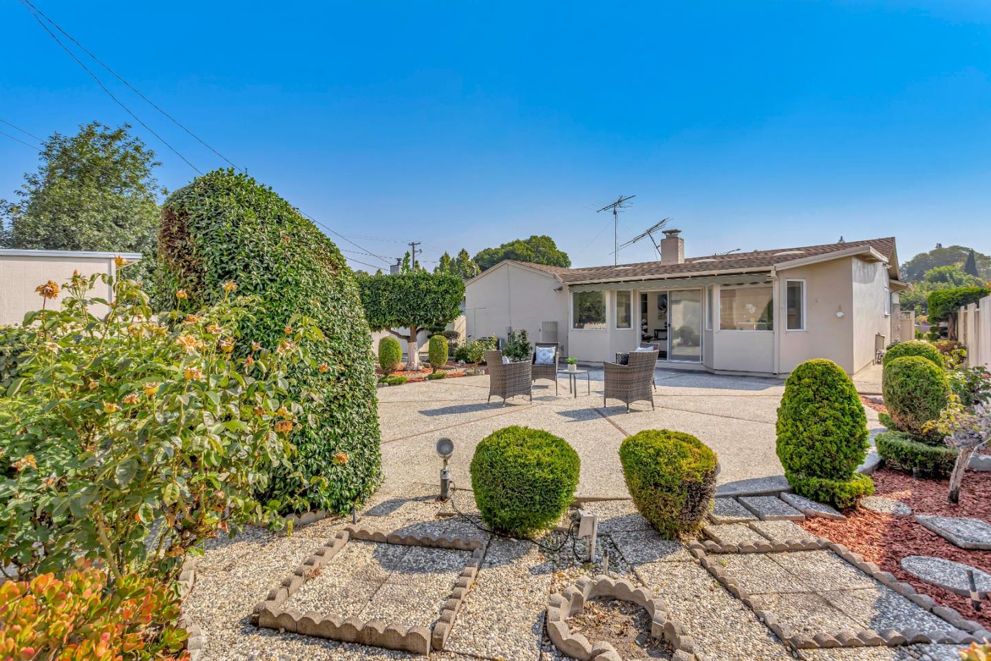 1548 Spring Street Mountain View, CA 94043 - Photo 36 of 40 a view of a house with swimming pool and sitting area