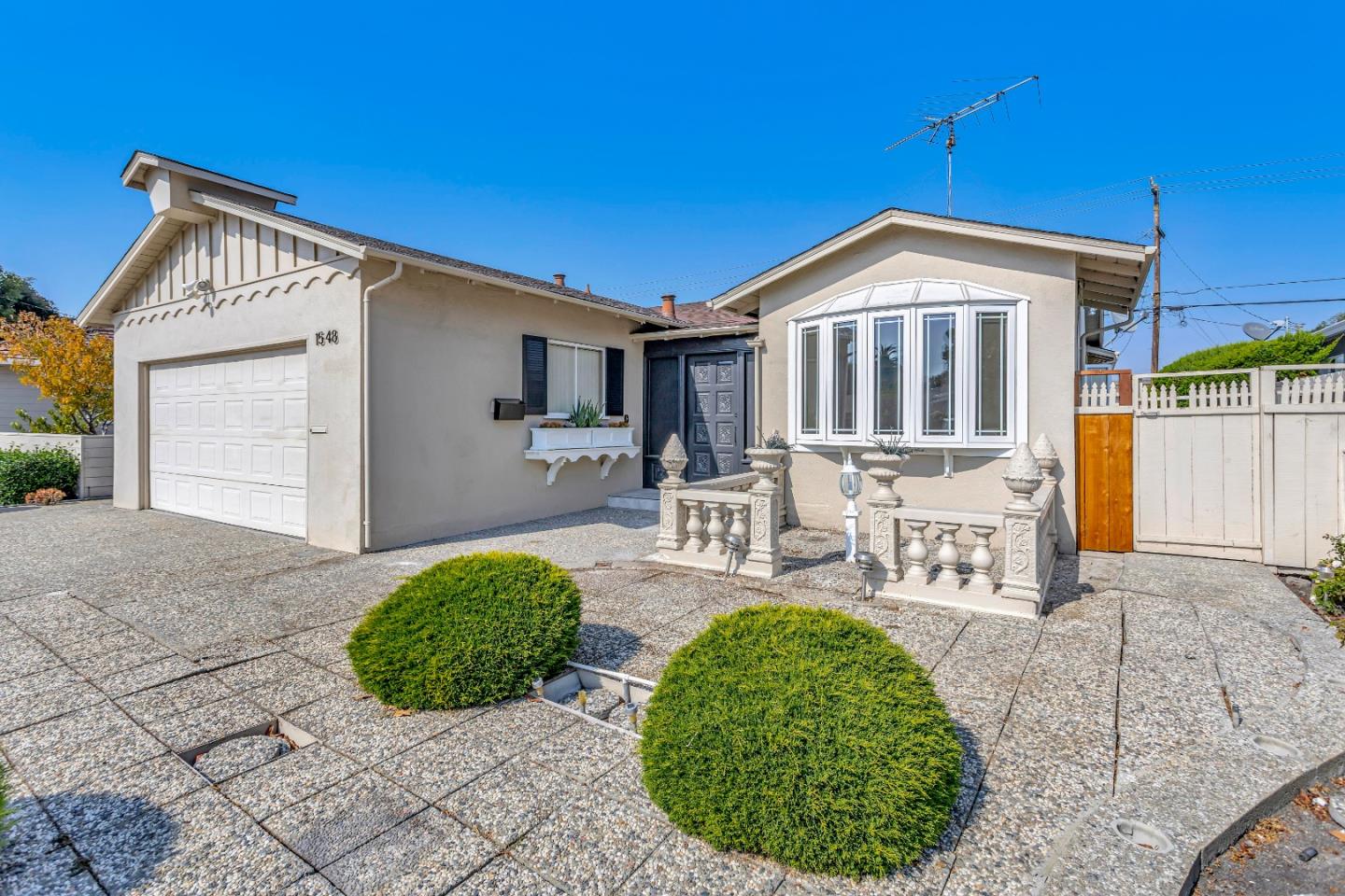 1548 Spring Street Mountain View, CA 94043 - Photo 38 of 40 a front view of a house with garden