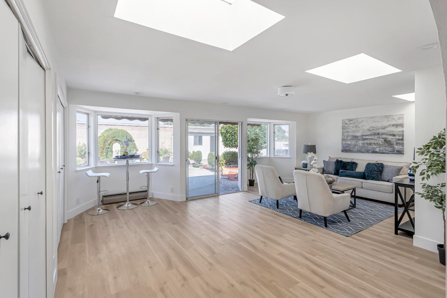 1548 Spring Street Mountain View, CA 94043 - Photo 7 of 40 a living room with furniture and a window