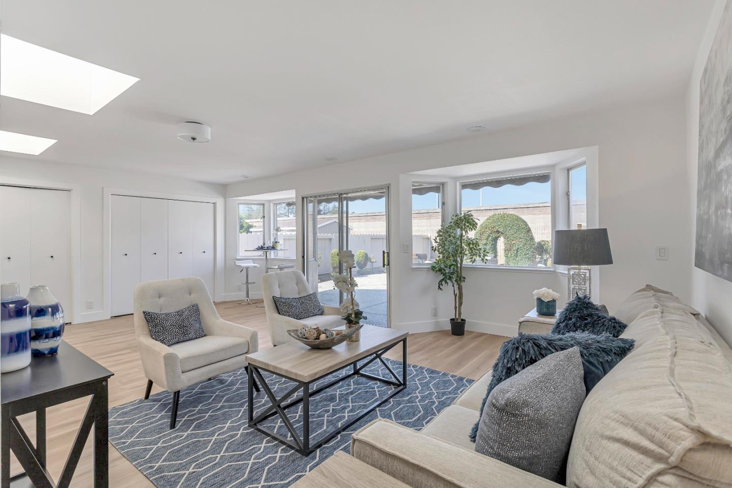 1548 Spring Street Mountain View, CA 94043 - Photo 10 of 40 a living room with furniture and a large window