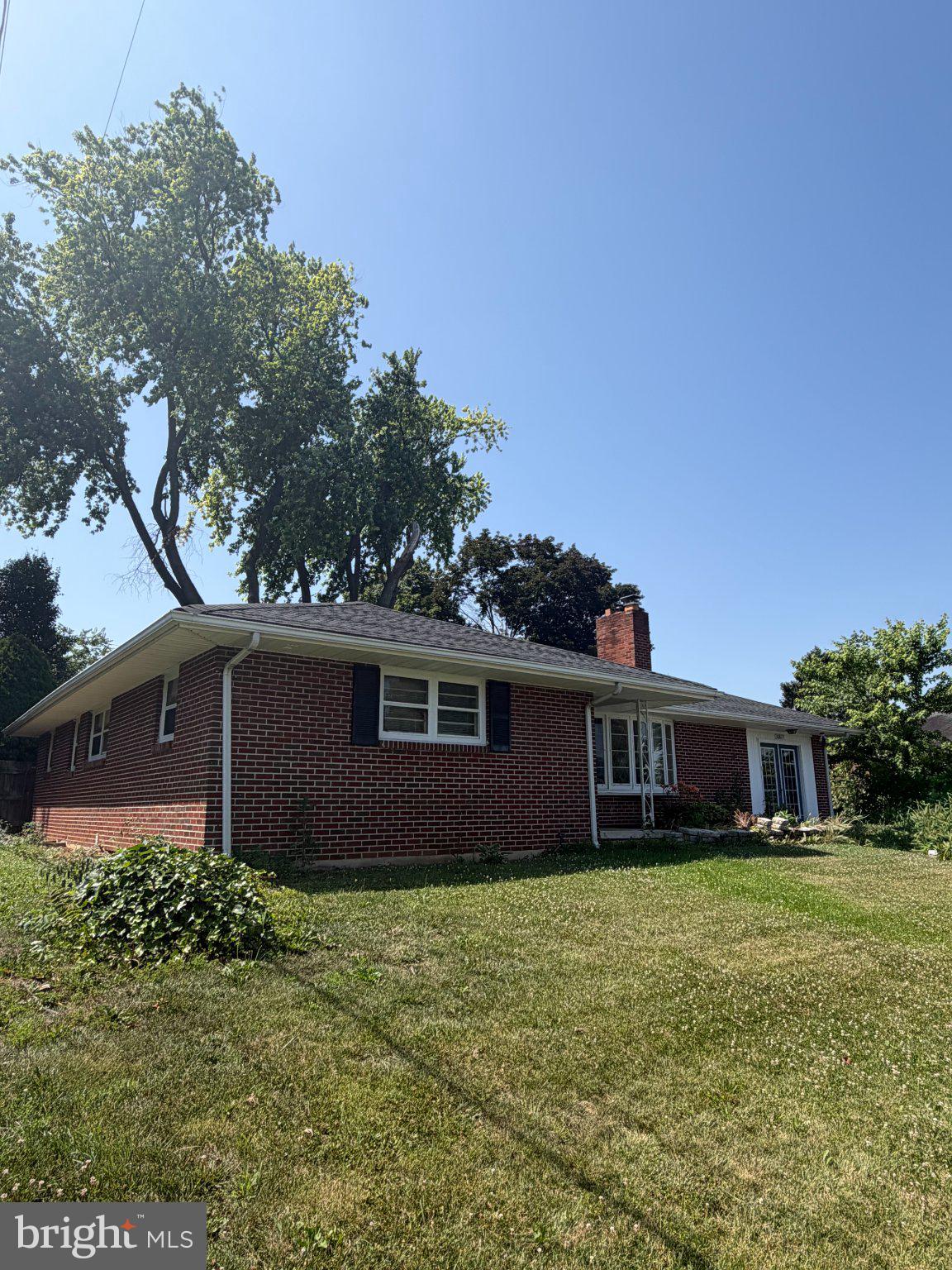 16827 Hampton Road Williamsport, MD 21795 - Photo 2 of 2 Charming brick home under clear skies.