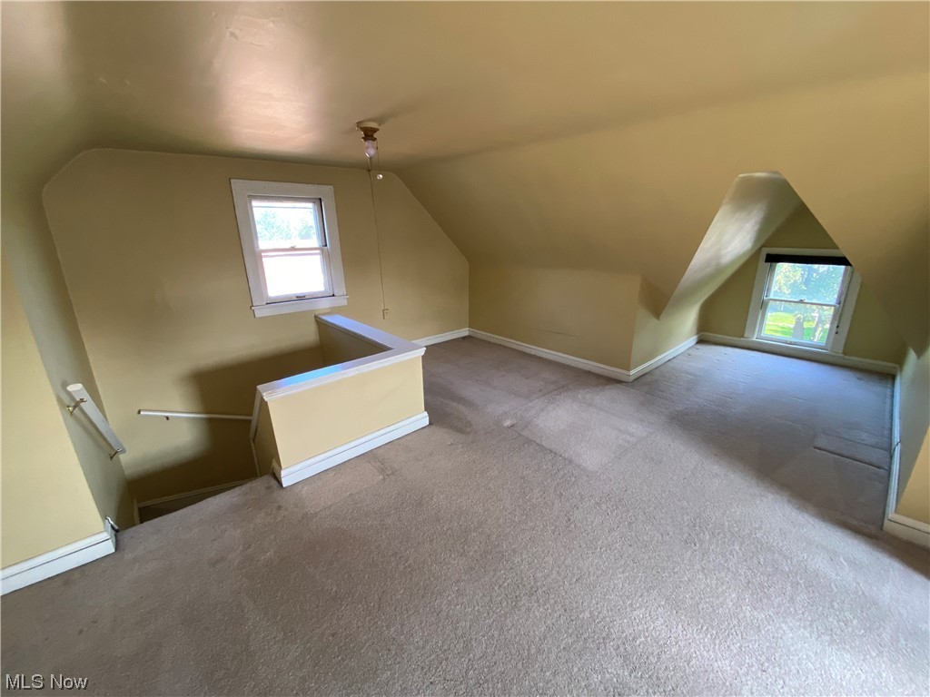 3630 Bainbridge Road Cleveland Heights, OH 44118 - Photo 17 of 21 Additional living space featuring light carpet and lofted ceiling