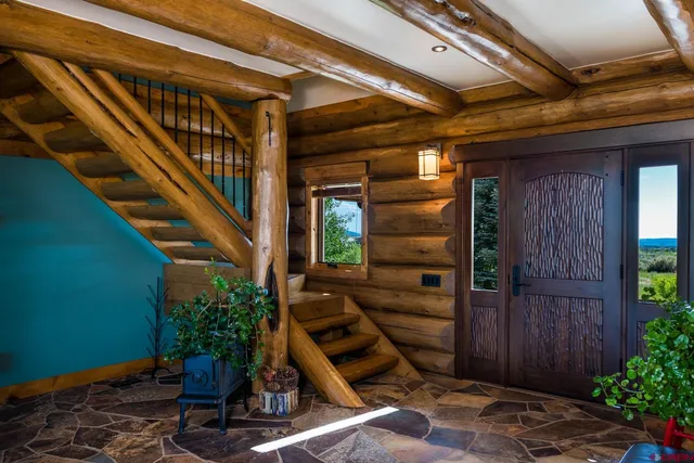 a view of an entryway with garden