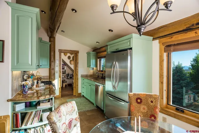a spacious bathroom with a granite countertop tub and a sink